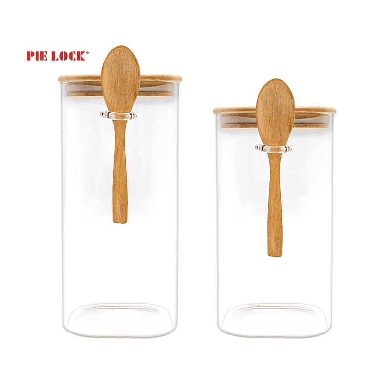 https://slyprc.com/wp-content/uploads/2022/08/square-glass-jars-with-lids-wholesale-with-Bamboo-Lid-and-Spoon2.png